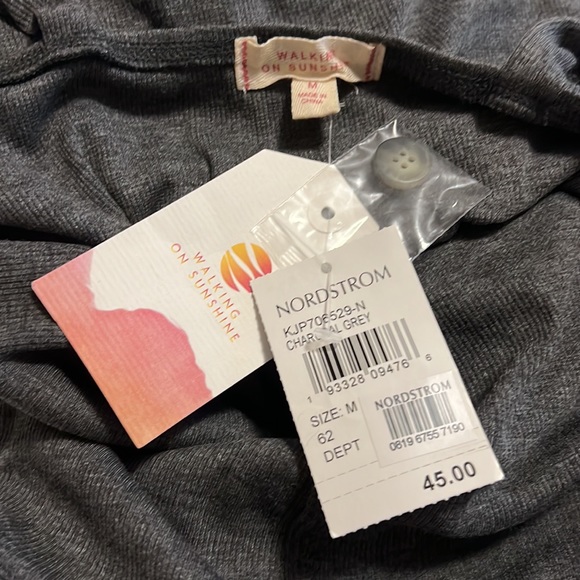 Gray, cropped/ankle jumpsuit with straight leg. Thin straps and button down top. - Picture 4 of 10